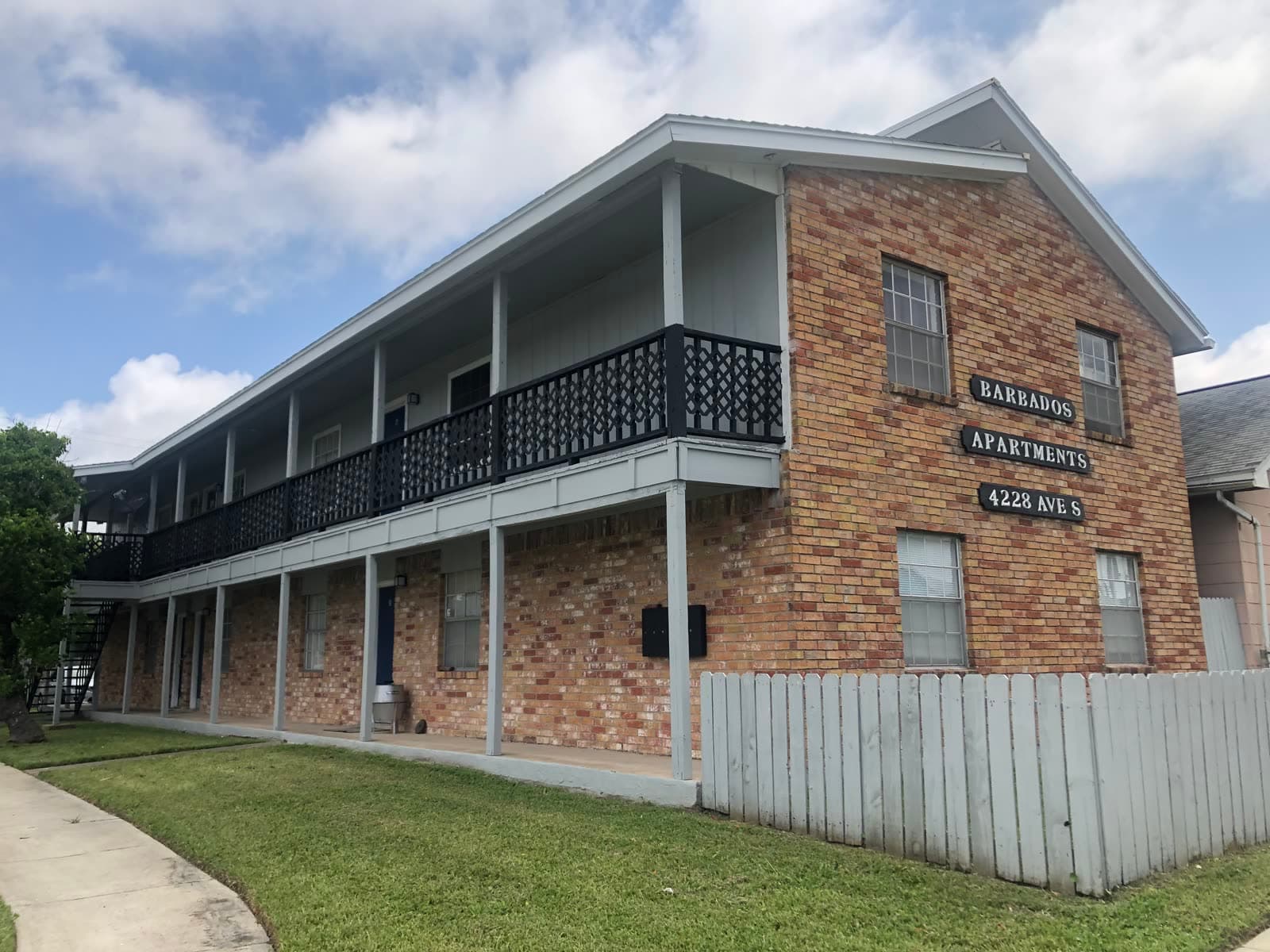 Brick exterior of 4228 Avenue S in Galveston, building-level view with no unit numbers