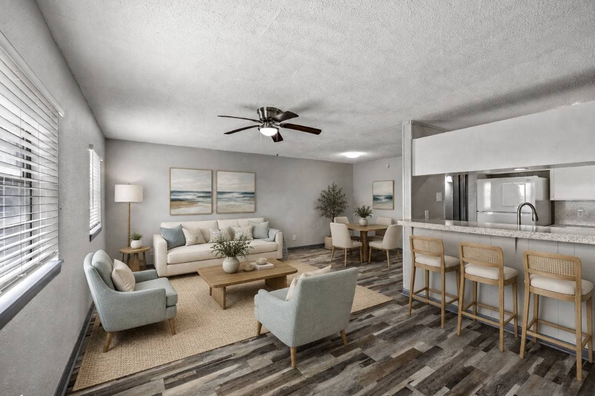 Newly renovated living, dining, and kitchen at 3rd Coast Apartments in Galveston